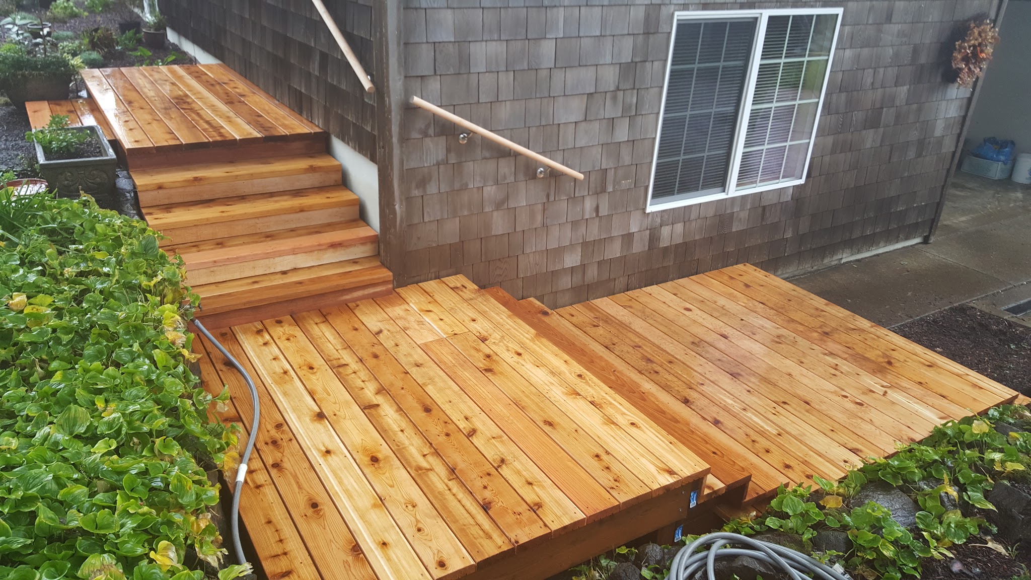 Finished cedar deck with built-in steps